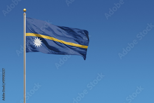 Nauru Flag in front of a clear blue sky