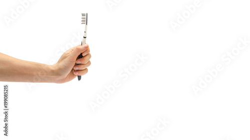 woman hand holding toothbrush. Isolated on white background. copy space, template.