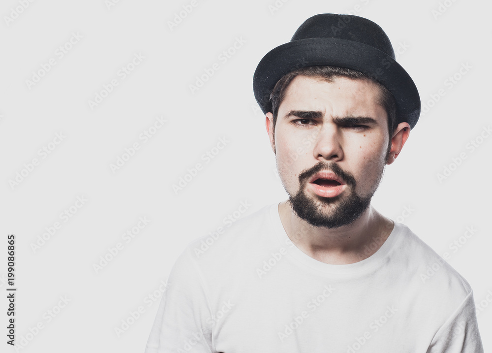 Portrait of surprised bearded man against white background Portrait of surprised bearded man against white background