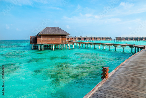 Over water bungalows on a tropical island  Maldives