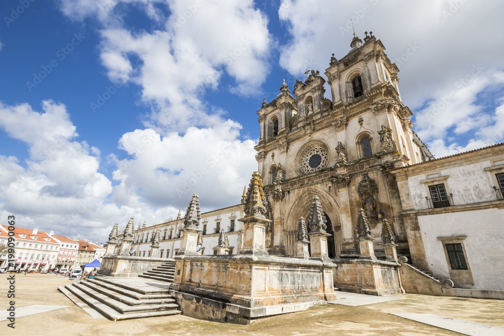 Main facade of the Alcobaca Monastery (Mosteiro de Santa Maria) in Portugal, in gothic and baroque architecture. A World Heritage Site since 1997