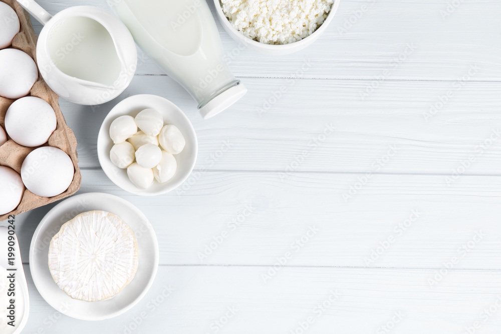 Dairy products on wooden table, top view Dairy products on wooden table, top view