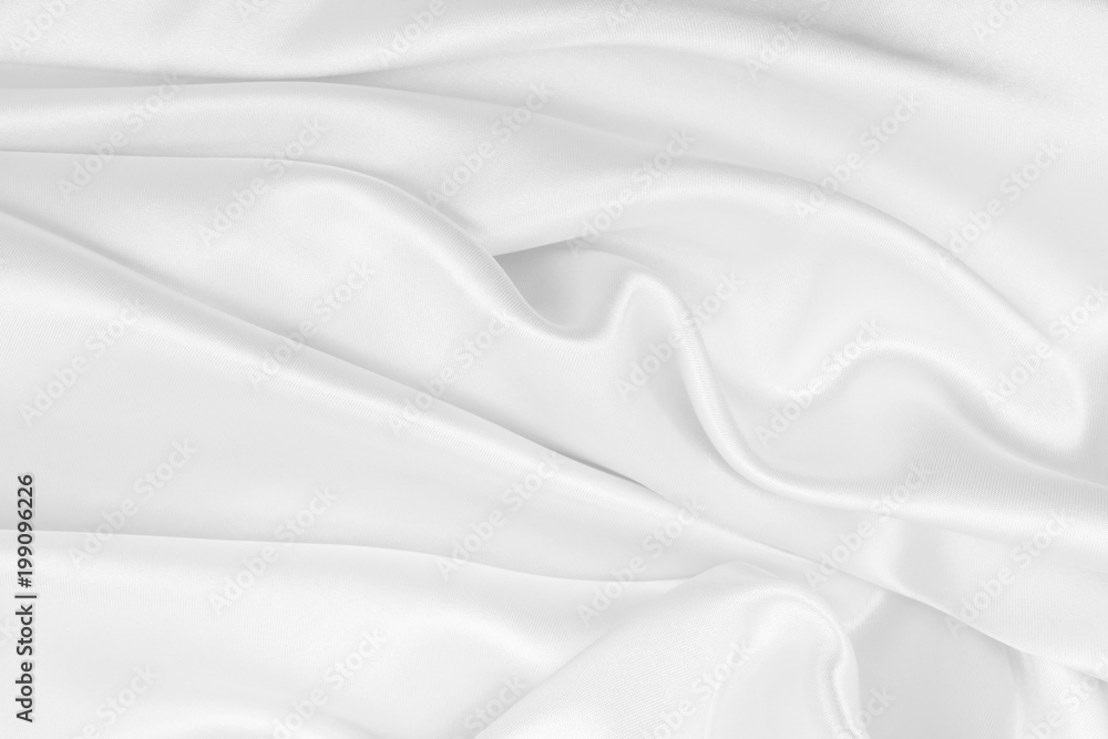 Smooth elegant white silk or satin luxury cloth texture as wedding background. Luxurious background design Smooth elegant white silk or satin luxury cloth texture as wedding background. Luxurious background design