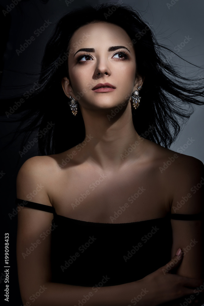 Lady in studio shoot, fashion model in black dress, elegant woman beauty portrait Lady in studio shoot, fashion model in black dress, elegant woman beauty portrait