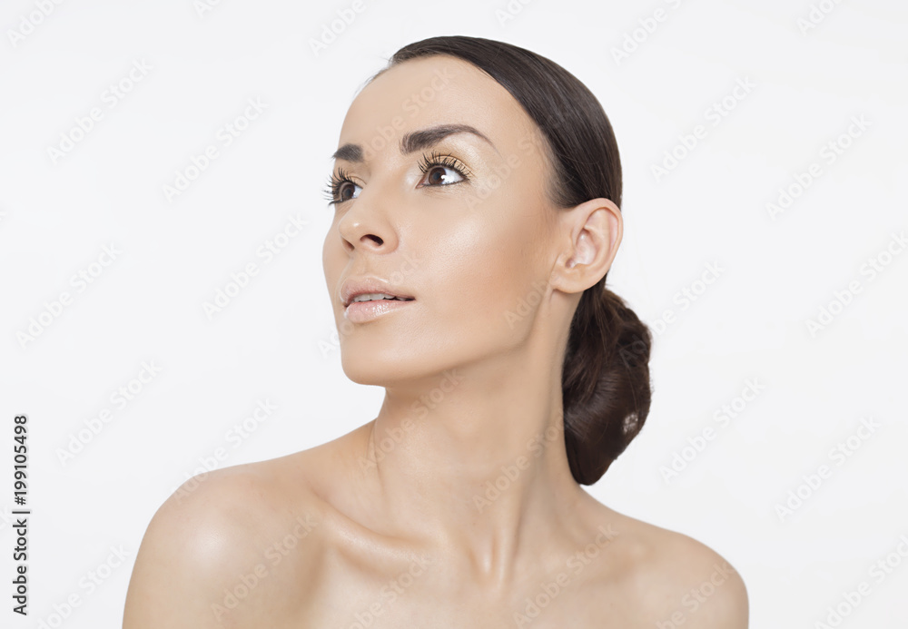 Close up portrait of beautiful young woman with clean fresh skin. Make up. Cosmetics and cosmetology. Care of skin. Spa treatments. Women Health.