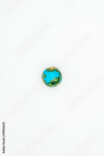top view of earth model isolated on white, earth day concept