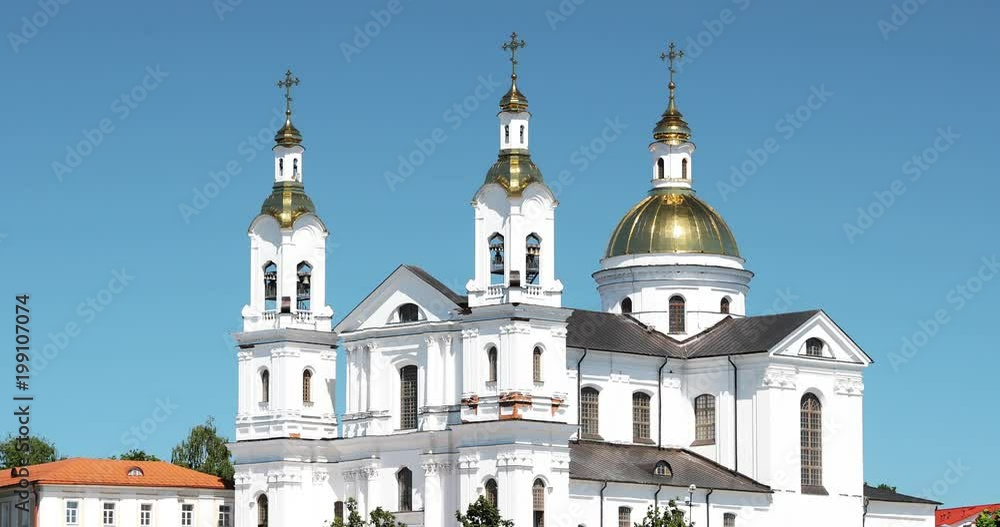 Vitebsk, Belarus. Close Up Of Assumption Cathedral Church In Upper Town On Uspensky Mount Hill In Summer Evening. Zoom, Zoom Out Vitebsk, Belarus. Close Up Of Assumption Cathedral Church In Upper Town On Uspensky Mount Hill In Summer Evening. Zoom, Zoom Out