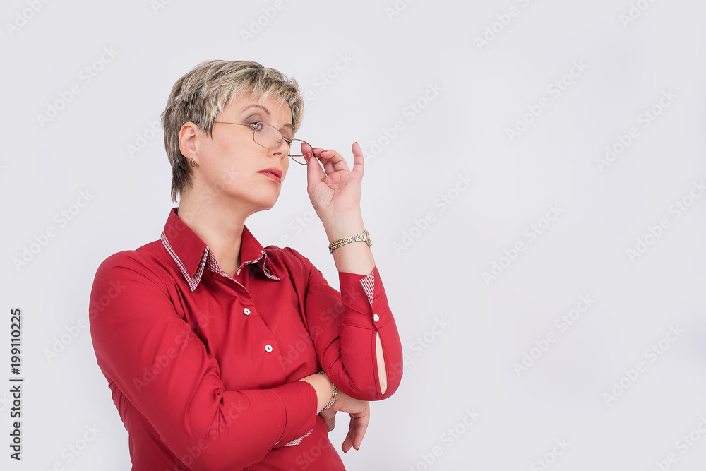 The image of a beautiful girl from the office on a white background. Tablet and glasses. The image of a beautiful girl from the office on a white background. Tablet and glasses.