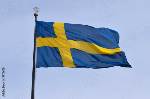 Swedish flag flying on flagpole