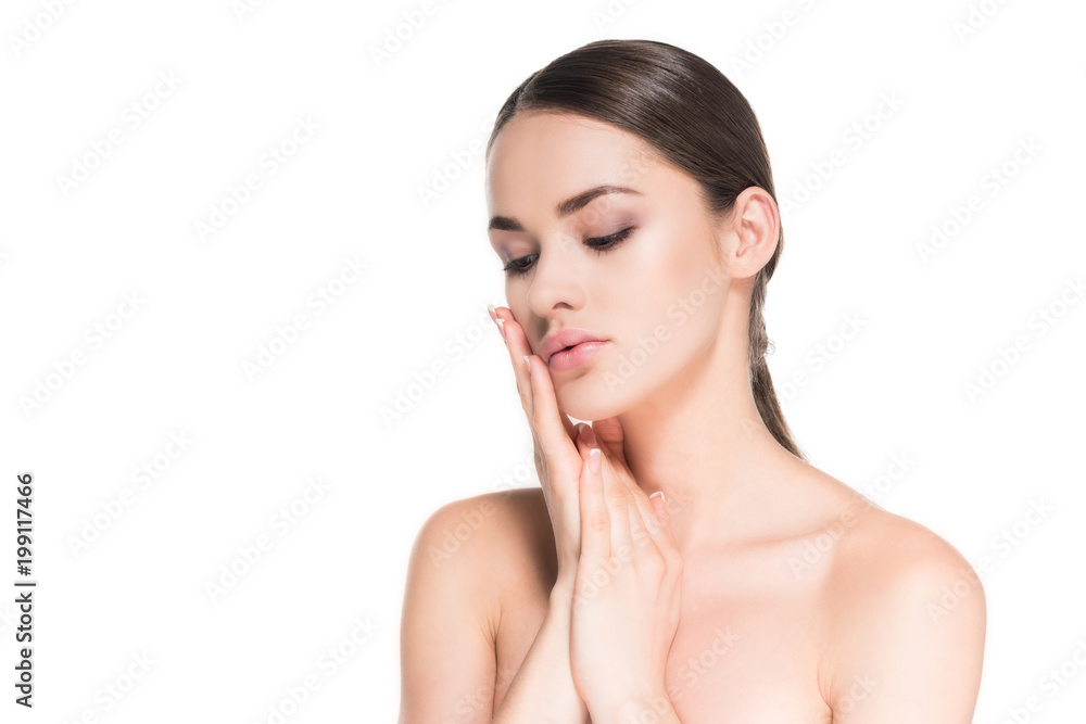 beautiful young woman with perfect skin touching her face isolated on white beautiful young woman with perfect skin touching her face isolated on white