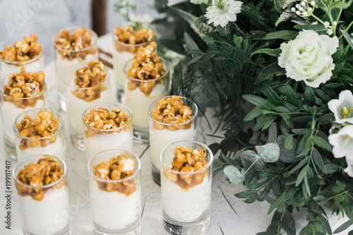 desserts over white background with flowers