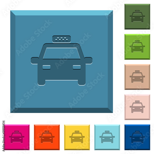 Taxi car engraved icons on edged square buttons photo