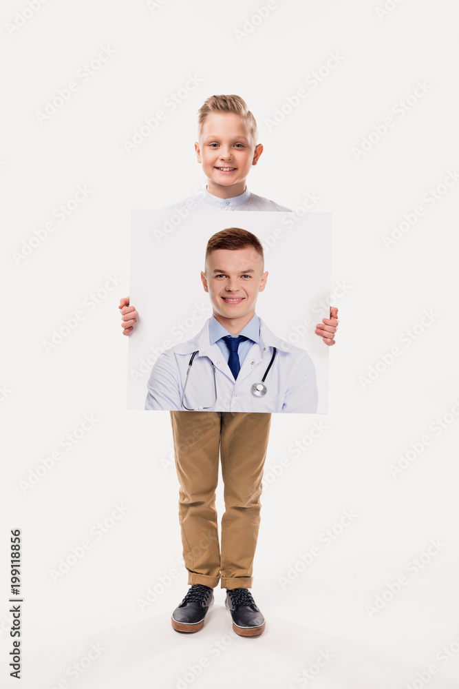 adorable boy pretending to be professional doctor, isolated on white