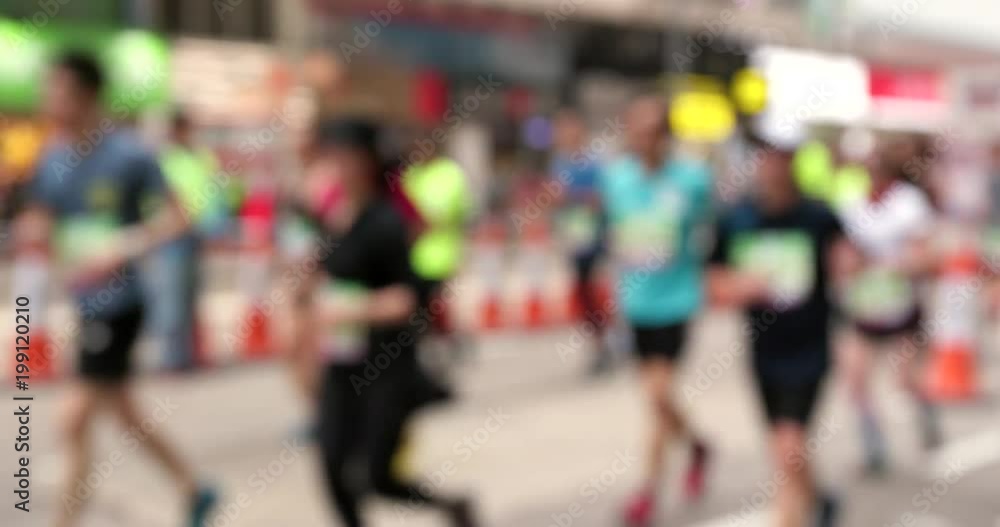 Blur view of standard chartered marathon in the city
