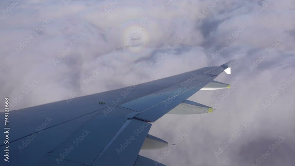 Traveling by air. View through an airplane window Traveling by air. View through an airplane window