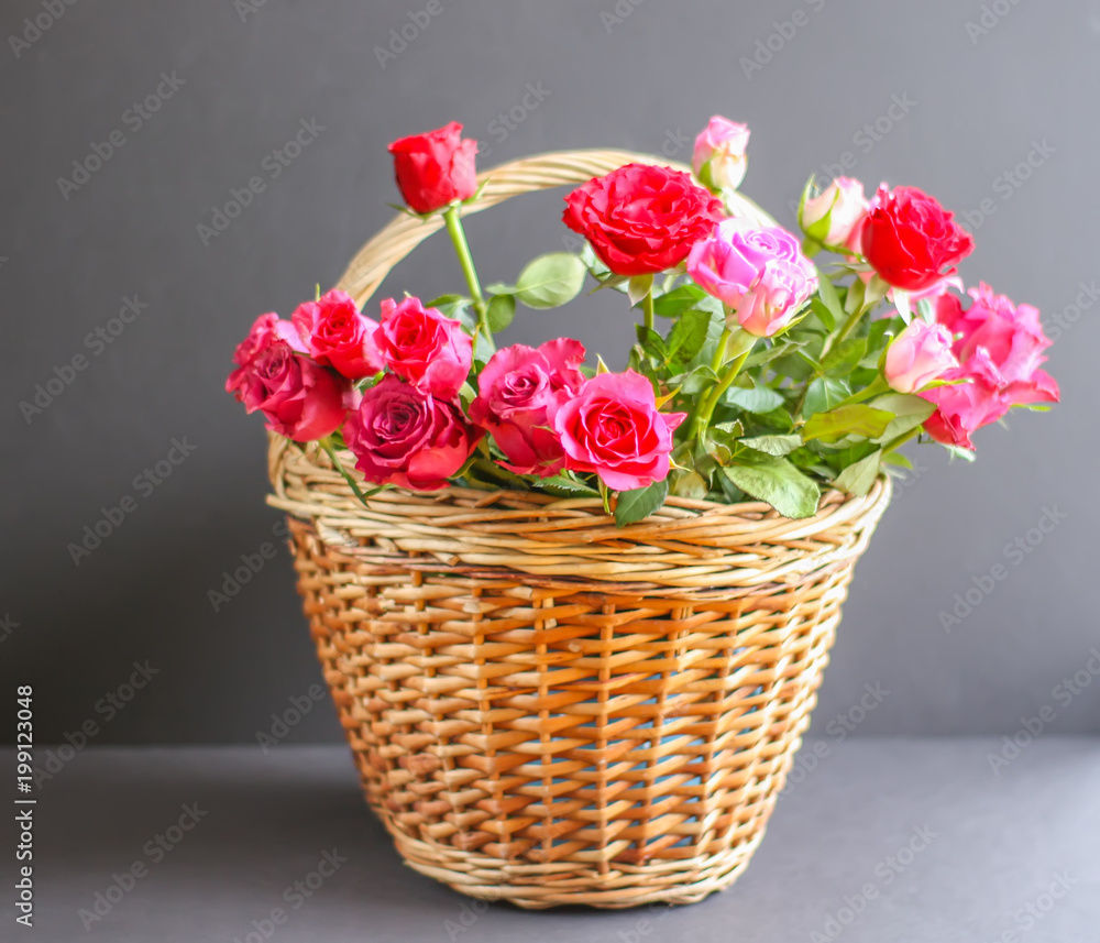 Beautiful pink and red in a basket.