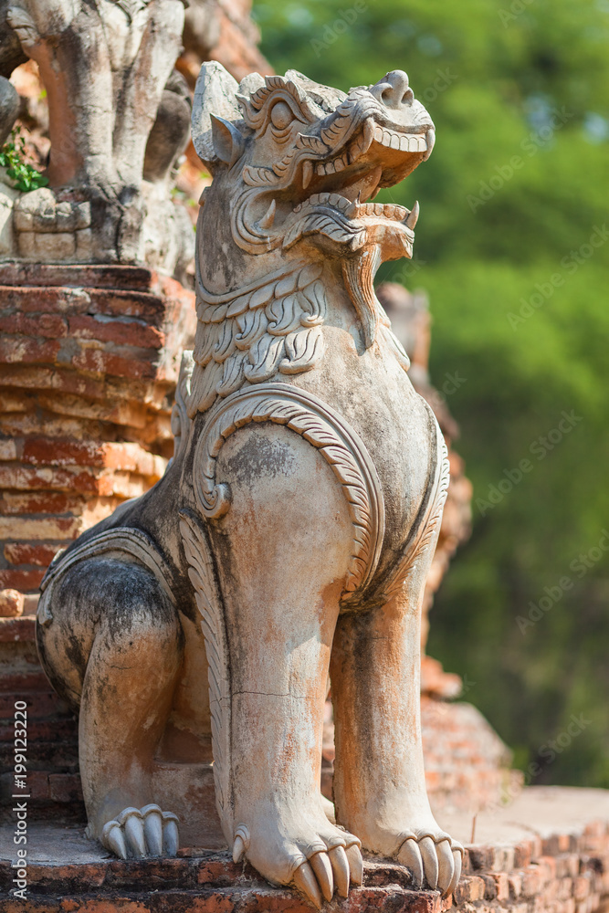 Lion guardian, decoration at Daw Cyan Pagoda Complex in ancient city Inwa (Ava) Mandalay, Myanmar