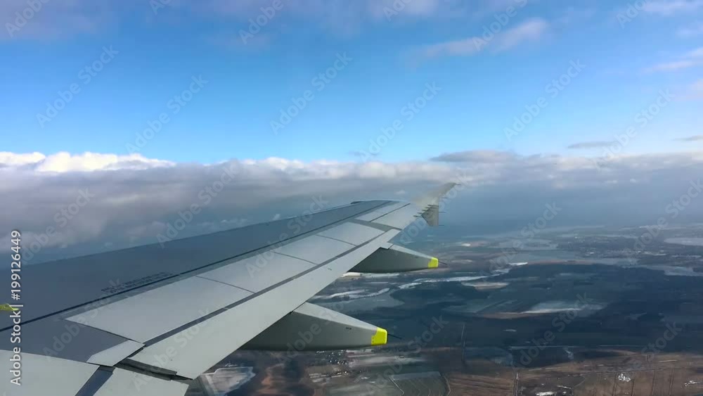 View out of airplane window landing at major international Airport in Berlin, Germany, time lapse View out of airplane window landing at major international Airport in Berlin, Germany, time lapse