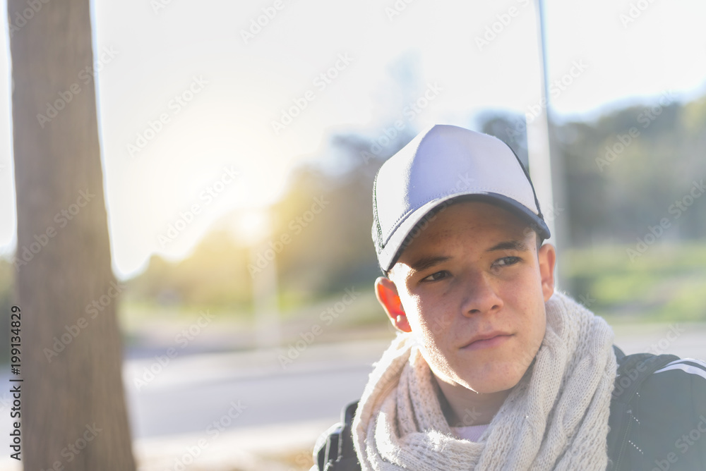 Portrait of a serious young man wearing a cap Portrait of a serious young man wearing a cap