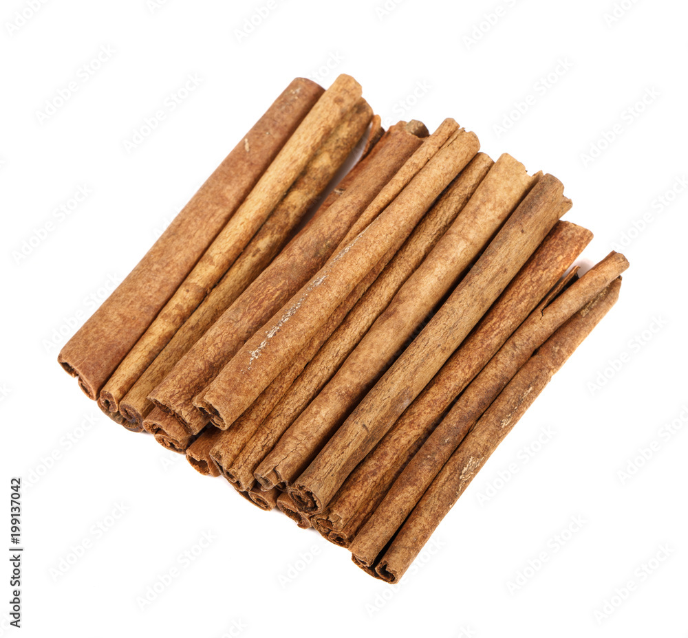 Cinnamon stick isolated on white background. Close-up. Cinnamon stick isolated on white background. Close-up.
