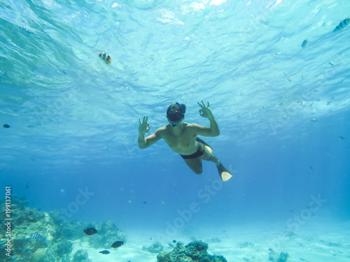 Bora Bora, French Polynesia. Snorkeling in turquoise waters.