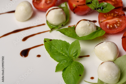 Caprese salad skewer with tomato, mozzarella and basil italian food and healthy vegetarian diet