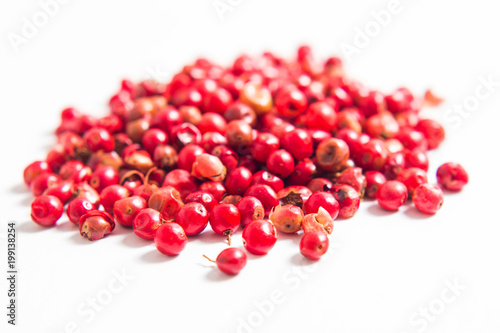 Canvas Print Organic peppercorn or pink pepper on white background