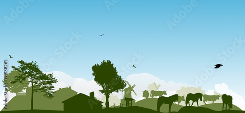 green landscape with farm animal near village