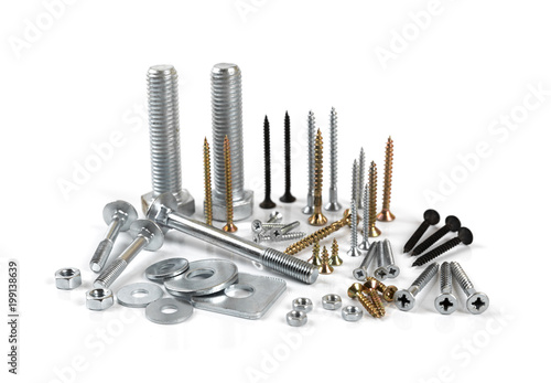 variety of screws and fasteners isolated on white background photo
