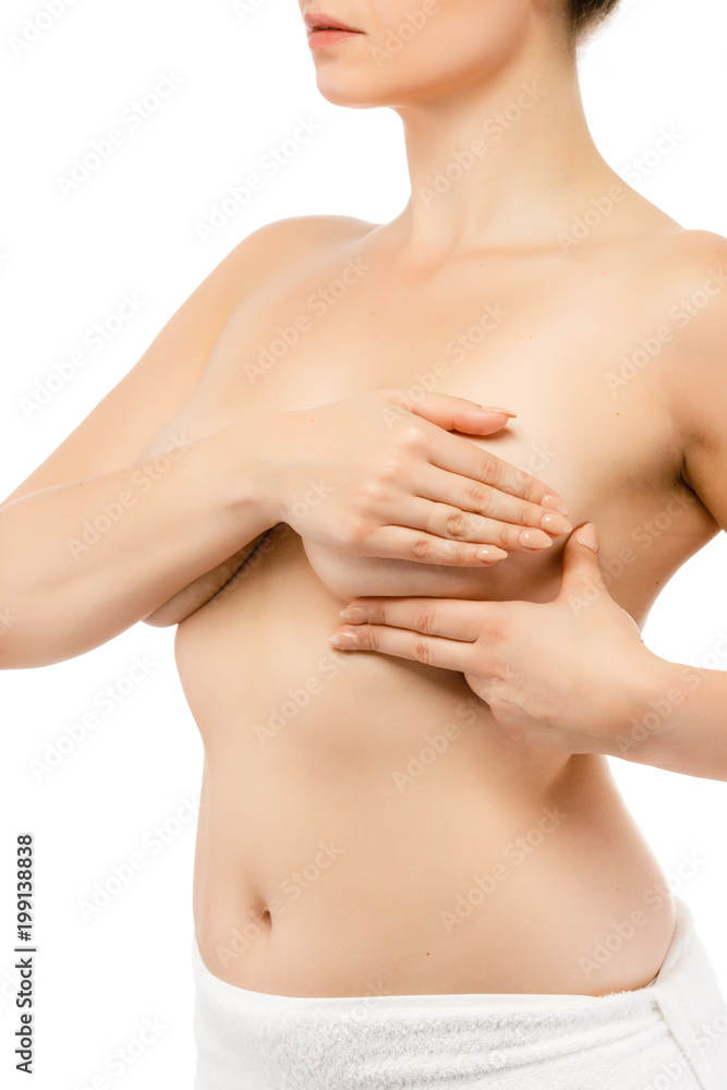 Woman examining breast isolated on white background Woman examining breast isolated on white background