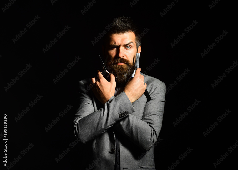 Business and barbershop concept. Man with beard Business and barbershop concept. Man with beard