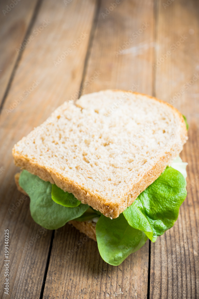 Sandwich avocado, salad and mozzarella. Selective focus. Sandwich avocado, salad and mozzarella. Selective focus.