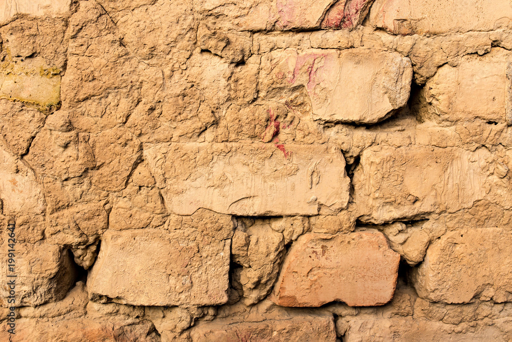 Old brick wall in the house as a background Old brick wall in the house as a background