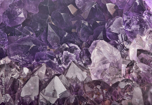 dark lilac amethyst crystals macro backgrond
