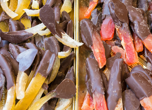 Candied fruit peel dipped in dark chocolate. Typical Sicilian Pastry, Italy photo