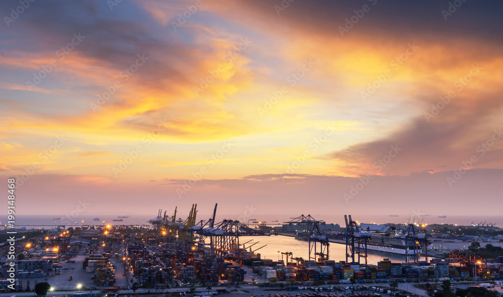 Obraz premium Containers yard in port congestion with ship vessels are loading and discharging operations of the transportation in international port.