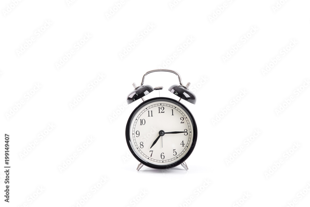 Classic black alarm clock isolated on a white background Classic black alarm clock isolated on a white background