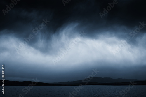 dramatic storm clouds landscape