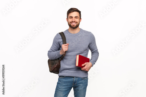 Smart student with book and backpack