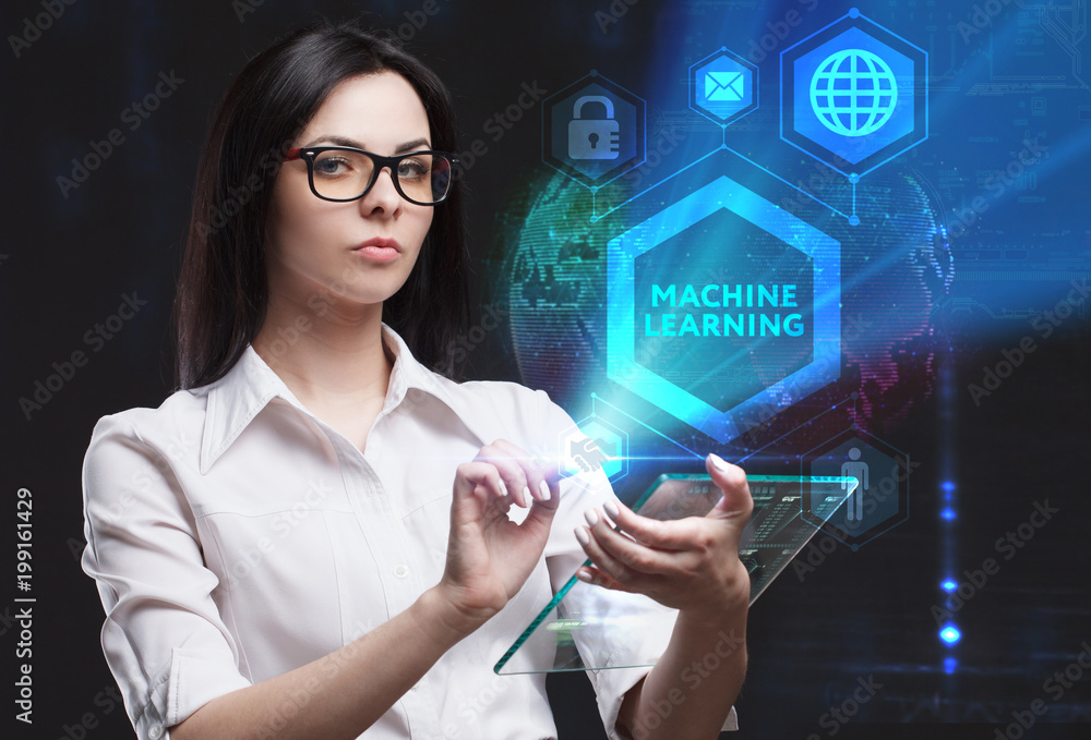 The concept of business, technology, the Internet and the network. A young entrepreneur working on a virtual screen of the future and sees the inscription: Machine learning The concept of business, technology, the Internet and the network. A young entrepreneur working on a virtual screen of the future and sees the inscription: Machine learning