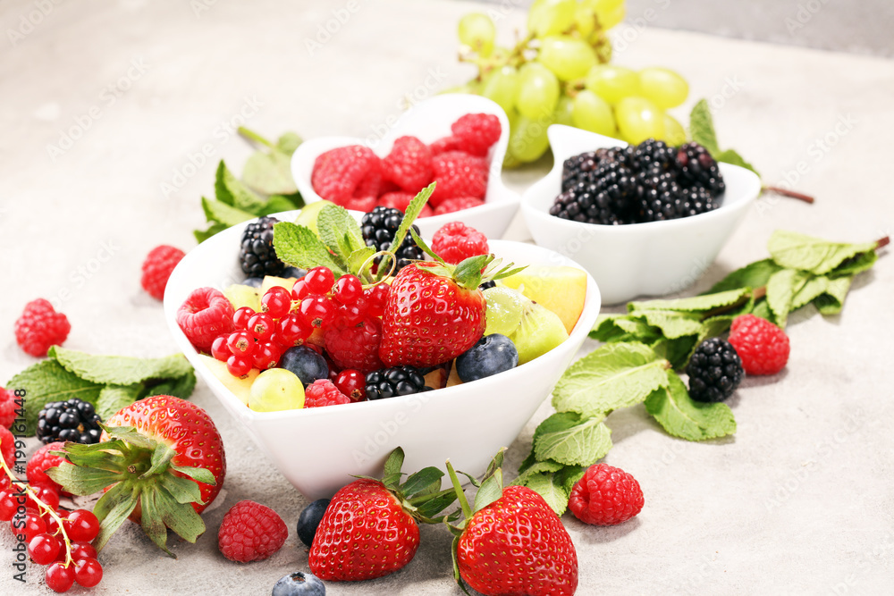 salad with fresh fruits and berries. healthy spring fruit salad salad with fresh fruits and berries. healthy spring fruit salad