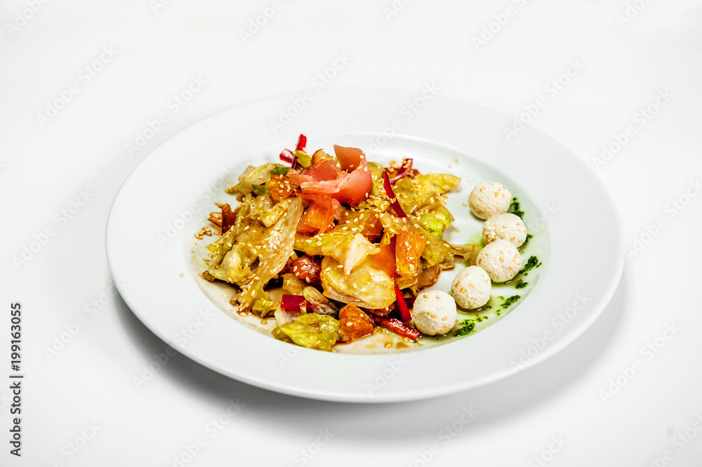 vegetable salad on a plate with cheese balls vegetable salad on a plate with cheese balls