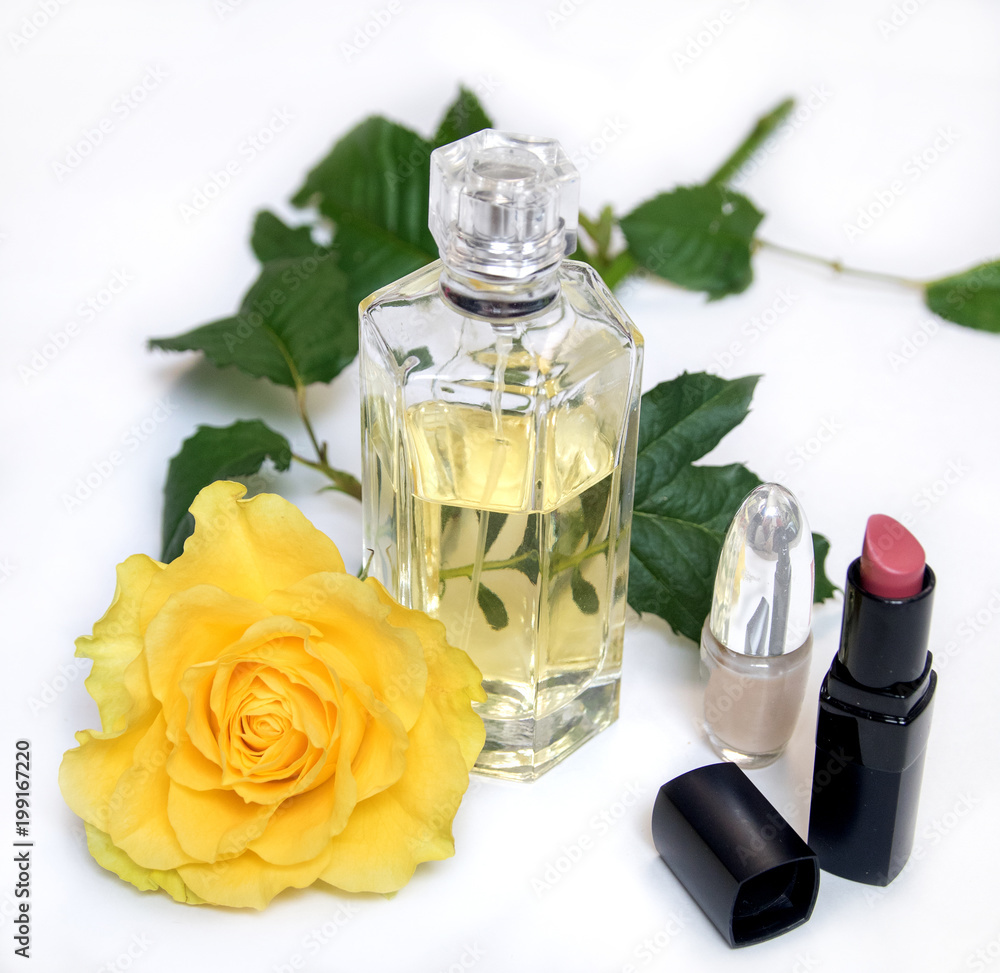 cosmetics with perfume, phone on a white background with copy space cosmetics with perfume, phone on a white background with copy space