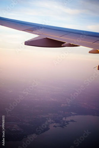 Photography Airplane wing and coastline