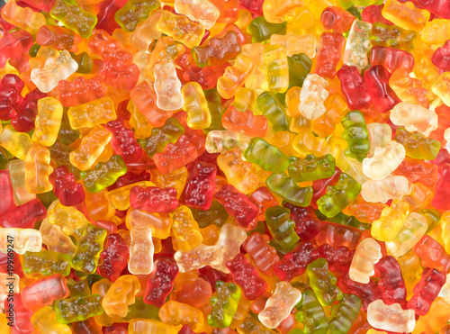 Brightly colored mixed jelly baby sweets / jelly babies in a candy sweet shop. Potential use as a background.