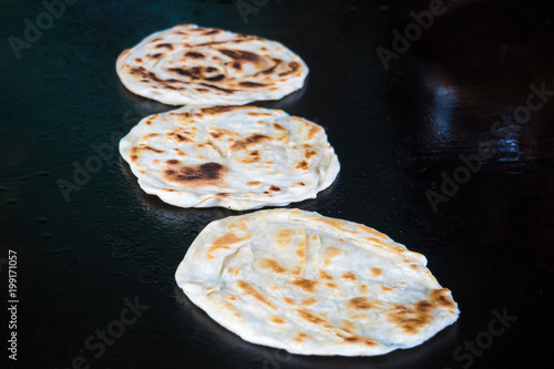 Indian chapatti on fire, Pushkar photo