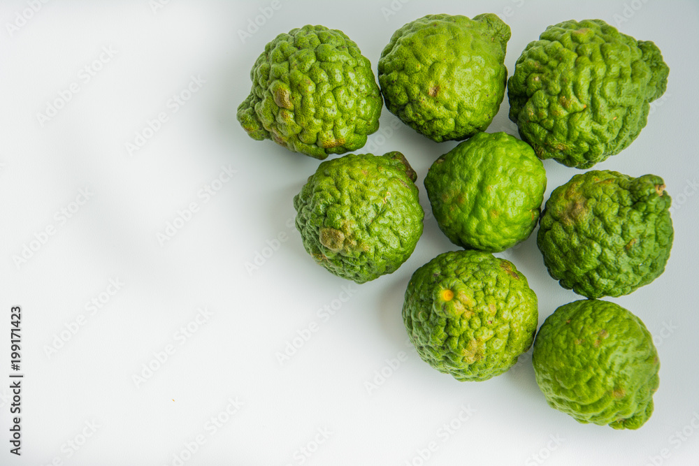 Obraz premium Bergamot on the white background. Citrus bergamia, the bergamot orange is a fragrant citrus with a yellow or green color similar to a lime.
