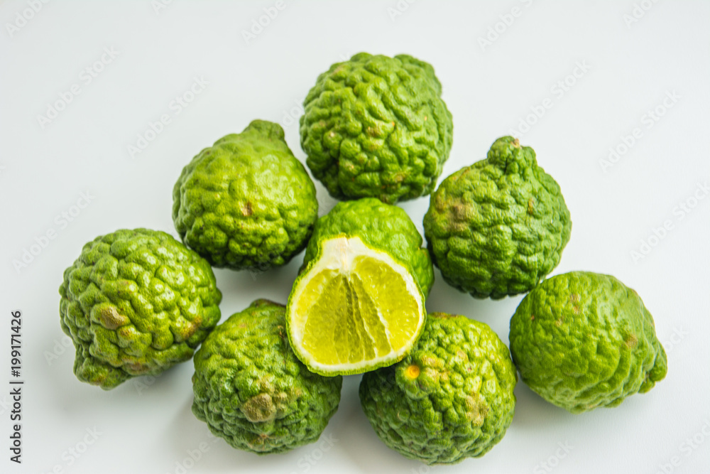 Bergamot on the white background. Citrus bergamia, the bergamot orange is a fragrant citrus with a yellow or green color similar to a lime. Bergamot on the white background. Citrus bergamia, the bergamot orange is a fragrant citrus with a yellow or green color similar to a lime.
