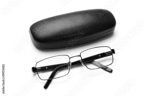 Black leatherette eyeglass case and eyeglasses in fine metal frame