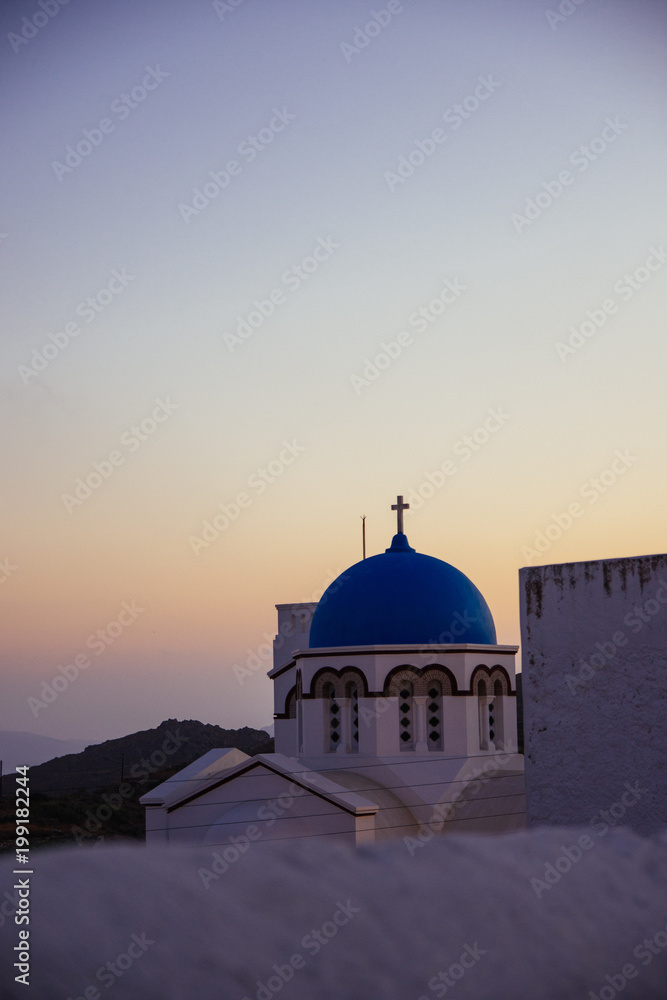 The dome of the church in Lagada as it appears from the highest point of the village at sunset
